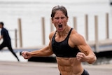 Tia-Clair Toomey leaving the water during the crossfit games 