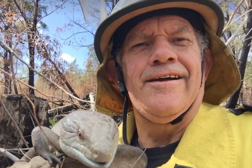 Mr Fransen smiling with lizard