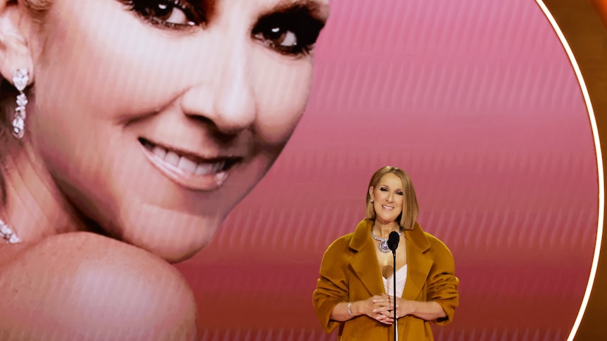 Celine Dion speaks onstage the 2024 Grammys.