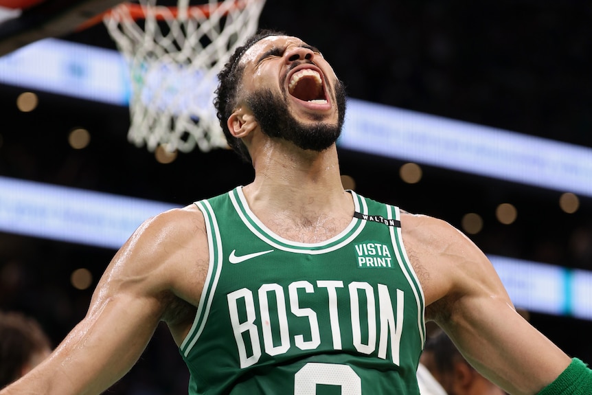 Jayson Tatum celebrates a basket in the NBA Finals