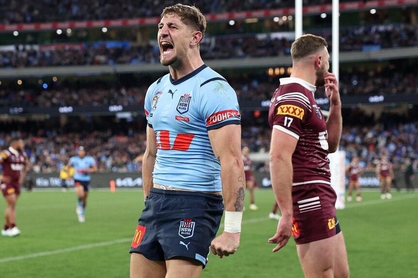 Zac Lomax celebrates scoring a try against the Maroons.