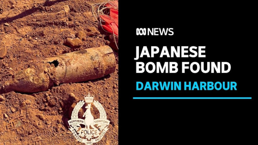 Japanese bomb Found. Darwin Harbour. Exploded bomb shell in dirt. 