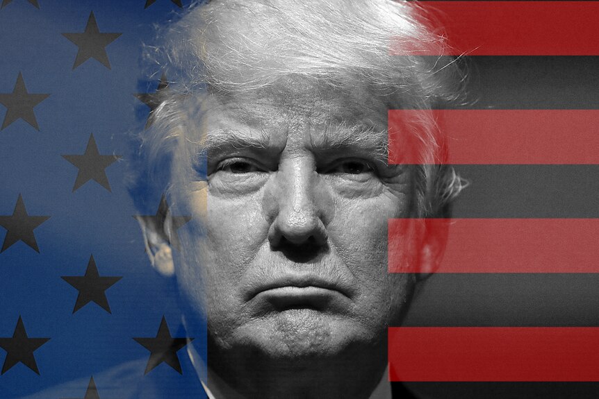 A black and white close up of Donald Trump's face, encroached on both sides by the stars and stripes of the US flag.