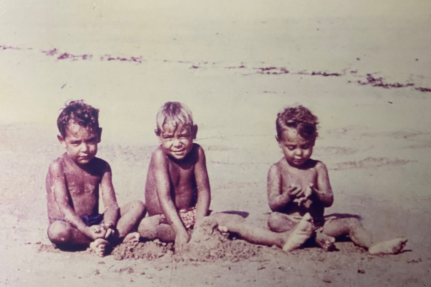 William Tilmouth with his brothers Bruce and Pat on the beach at Croker Island.