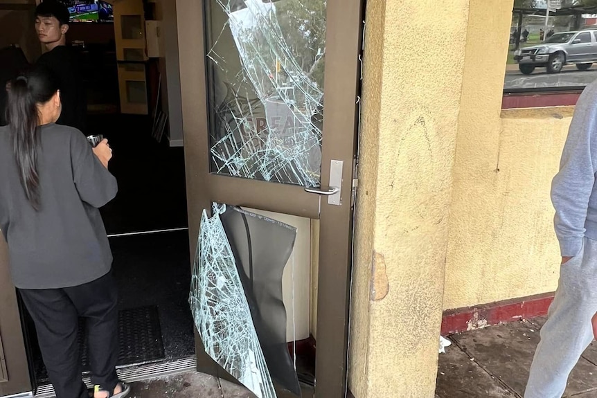 The doors of the Todd Tavern are seen smashed.