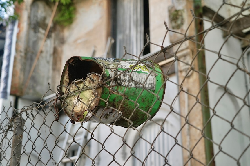 Mailbox outside a derelict terrace house