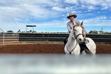 75-year-old Kenny Boulton on Horseback in a cattleyard at the Charleville Showgrounds.