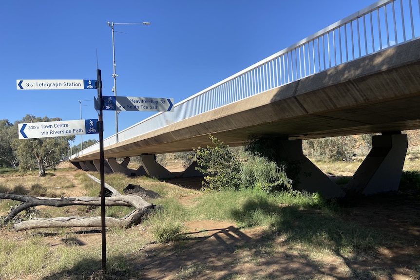 A concrete walkway crossing a dry riverbed in Alice Springs.