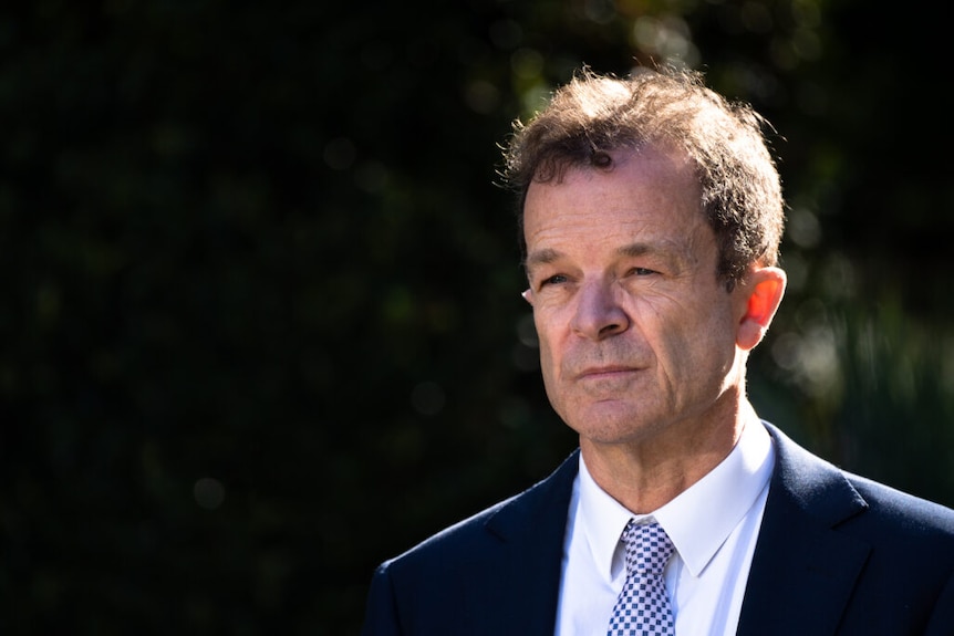 Mark Speakman wearing a shirt and tie