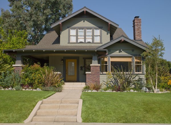 A two-story home in a suburban neighborhood.