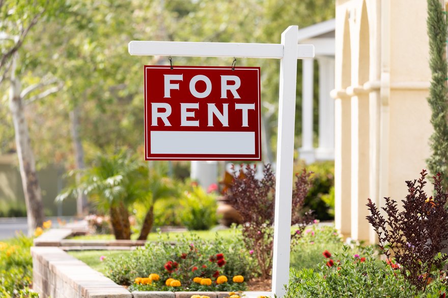 For Rent sign in front of home.