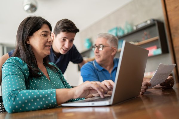 Parents talking to their teen about finances. 