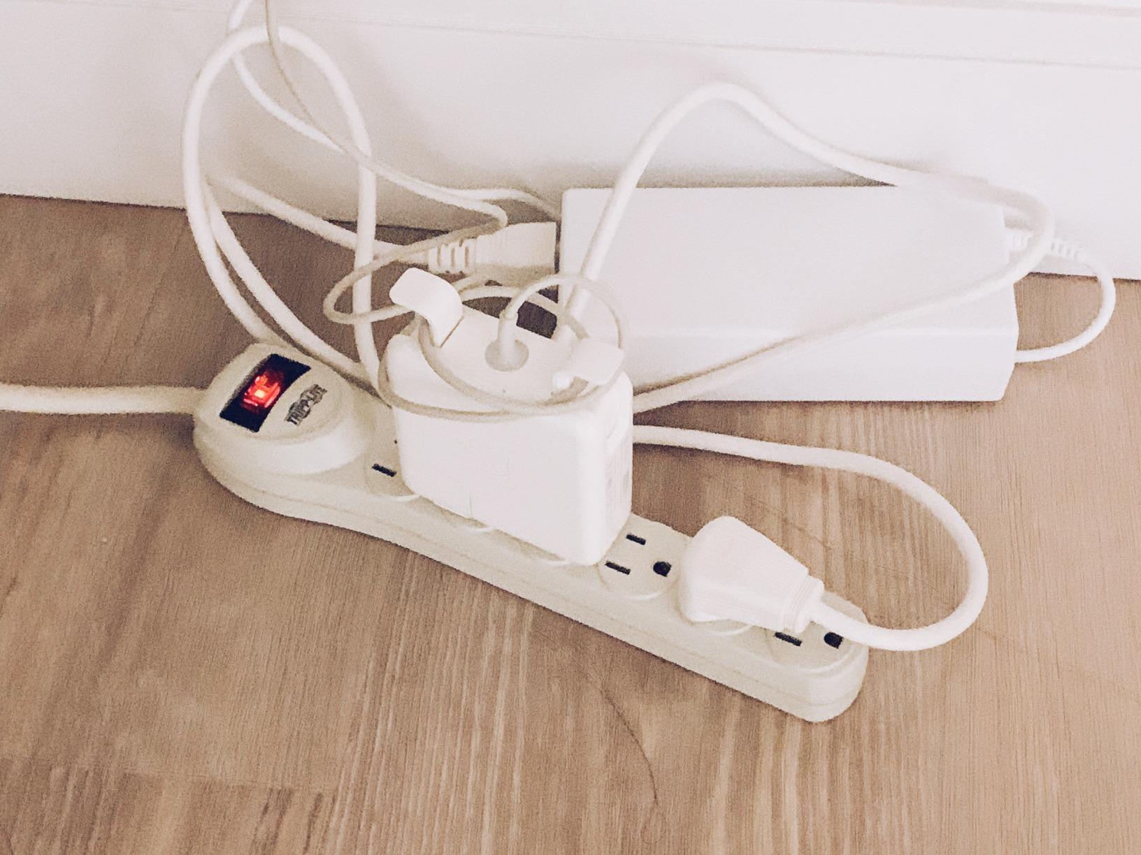 Typical surge protector that works well but has a stiff cord!