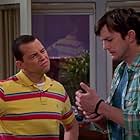 Jon Cryer and Ashton Kutcher in Two and a Half Men (2003)
