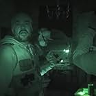 Aaron Goodwin and Zak Bagans in Industrial District of the Damned (2020)