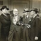 Paul Bryar, James Eagles, Harry Harvey, and Lucien Littlefield in Silent Witness (1943)