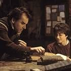 Chris Columbus and Daniel Radcliffe in Harry Potter and the Chamber of Secrets (2002)