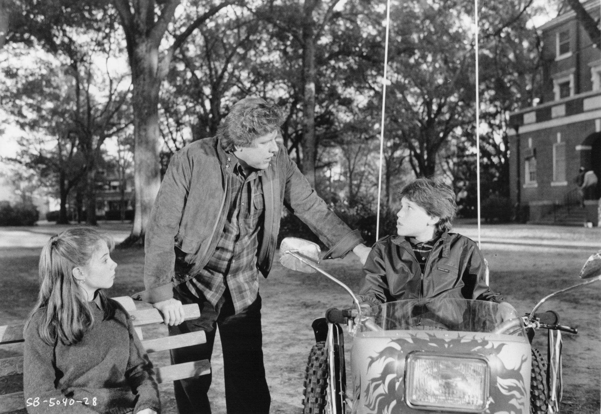 Corey Haim, Gary Busey, and Megan Follows in Silver Bullet (1985)