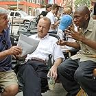 Bruce Willis, Richard Donner, and Yasiin Bey in 16 Blocks (2006)