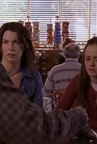 Alexis Bledel, Lauren Graham, and Scott Patterson in Gilmore Girls (2000)