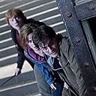 Rupert Grint, Daniel Radcliffe, and Emma Watson in Harry Potter and the Deathly Hallows: Part 2 (2011)