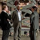 Morgan Freeman, Christian Bale, and Christopher Nolan in The Dark Knight Rises (2012)