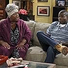 Cleo King and Reno Wilson in Mike & Molly (2010)