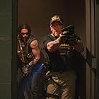 Arnold Schwarzenegger and Joe Manganiello in Sabotage (2014)