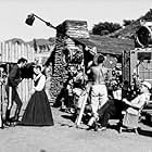 Rock Hudson with Julie Adams and director, Budd Boeticher, on the set of "Horizons West," 1952.