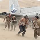 The Mongolian desert and weather wreak havoc on the survivors of a crashed plane, (L - R) Dennis Quaid as Towns, Giovanni Ribisi as Elliott, Kevork Malikyan, Miranda Otto, Scott Michael Campbell, Jacob Vargas, and Hugh Laurie.