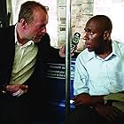 Bruce Willis and Yasiin Bey in 16 Blocks (2006)