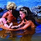 Brooke Shields, Christopher Atkins, and Chad Timmerman in The Blue Lagoon (1980)