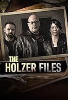 Dave Schrader, Cindy Kaza, and Shane Pittman in The Holzer Files (2019)