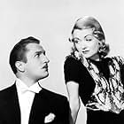 Constance Bennett and Vincent Price in Service de Luxe (1938)