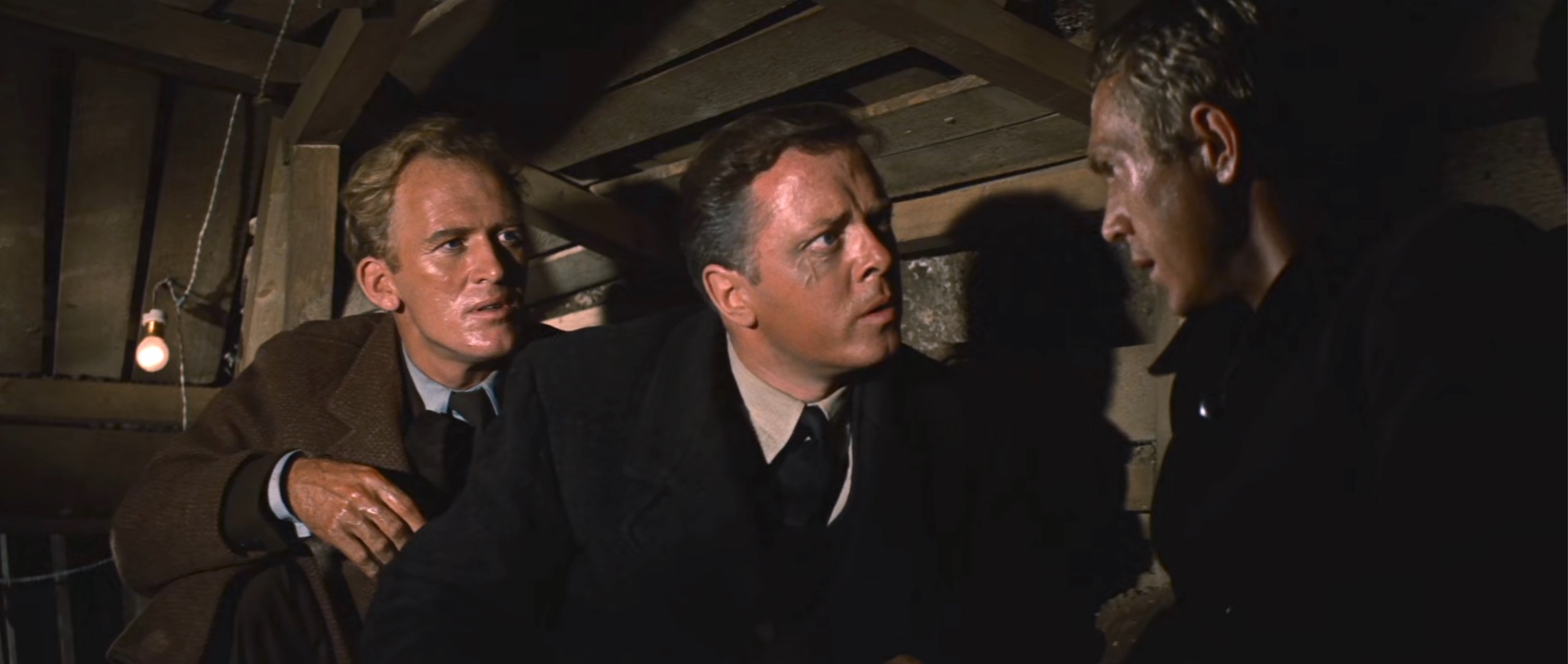 Richard Attenborough, Steve McQueen, and Gordon Jackson in The Great Escape (1963)