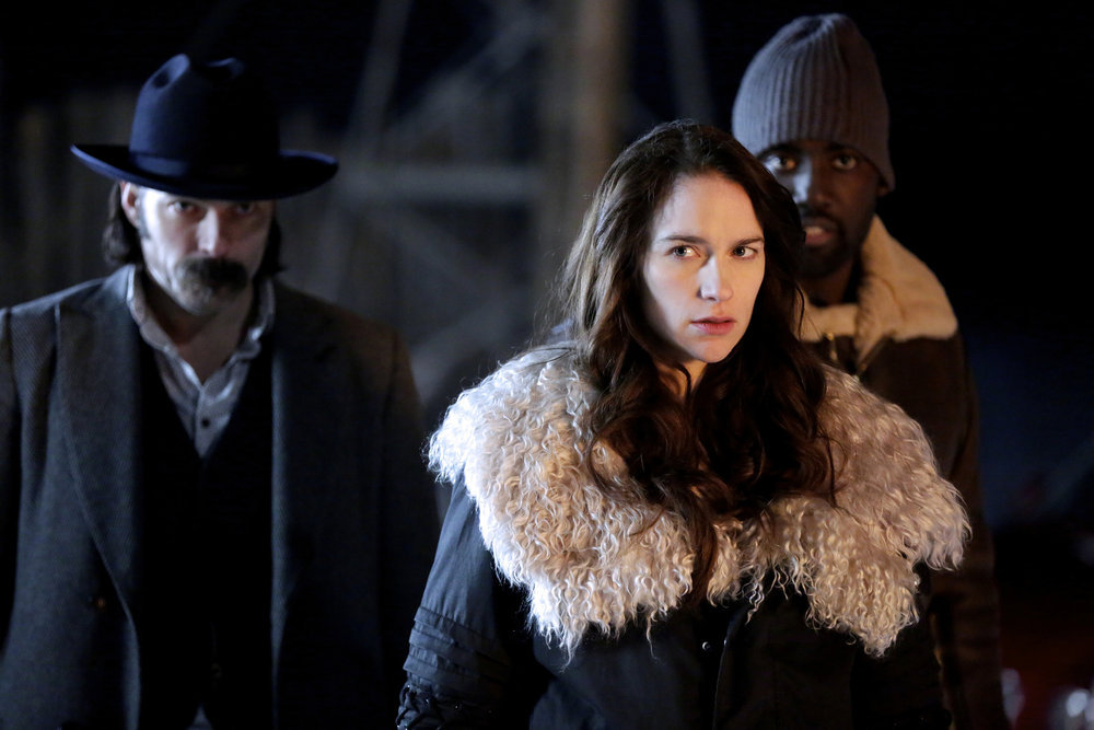 Tim Rozon, Melanie Scrofano, and Shamier Anderson in Wynonna Earp (2016)