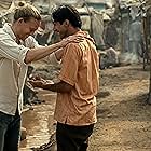 Charlie Hunnam and Shubham Saraf in Shantaram (2022)