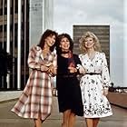 Rita Moreno, Valerie Curtin, and Rachel Parton George in Nine to Five (1982)