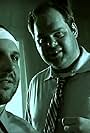 Brady Novak and Wade Randolph in Bomb in the Brain (2009)