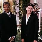 Lauren Graham and Yanic Truesdale in Gilmore Girls (2000)