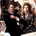 Tim Curry and Annie Potts in Pass the Ammo (1987)