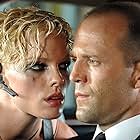 Jason Statham and Kate Nauta in Transporter 2 (2005)