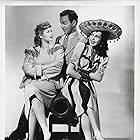 Lucille Ball, Richard Carlson, and Ann Miller in Too Many Girls (1940)