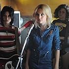 Dakota Fanning, Alia Shawkat, and Kristen Stewart in The Runaways (2010)