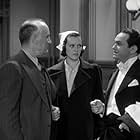 Edward G. Robinson, Donald Crisp, and Gale Page in The Amazing Dr. Clitterhouse (1938)