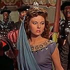 Susan Hayward, Ted de Corsia, and Jeanne Gerson in The Conqueror (1956)