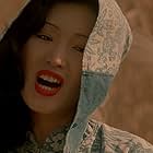 Gong Li in Shanghai Triad (1995)