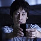 Lee Sun-kyun in Helpless (2012)