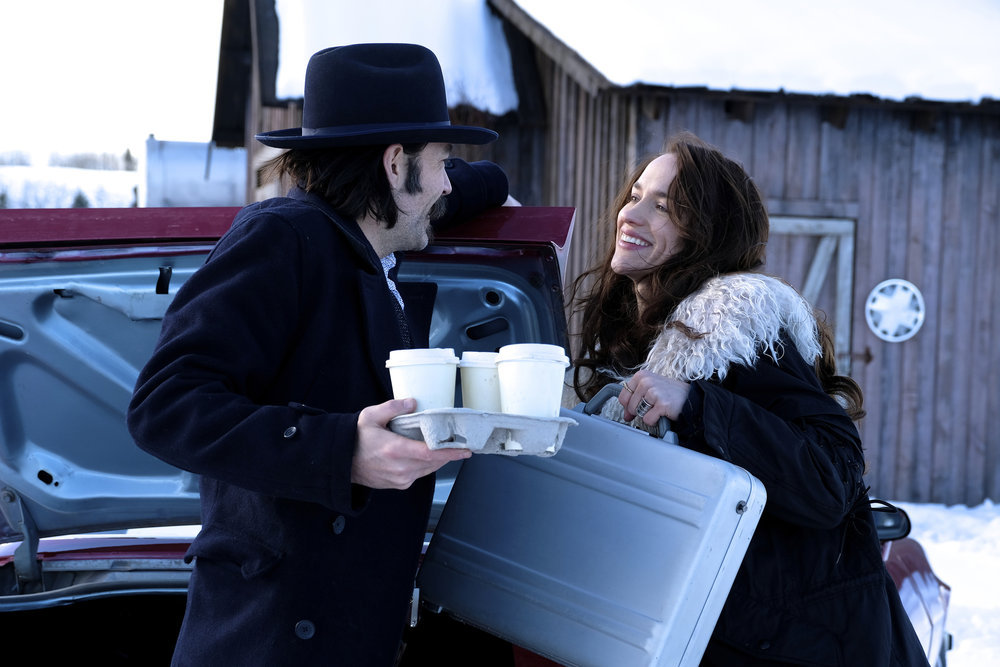 Tim Rozon and Melanie Scrofano in Wynonna Earp (2016)