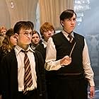 Rupert Grint, Matthew Lewis, Daniel Radcliffe, Emma Watson, Bonnie Wright, James Phelps, and Oliver Phelps in Harry Potter and the Order of the Phoenix (2007)